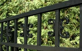 decorative aluminum fence with finials and scrolls